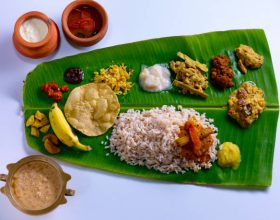 Traditional Onam sadya served in banana leaf